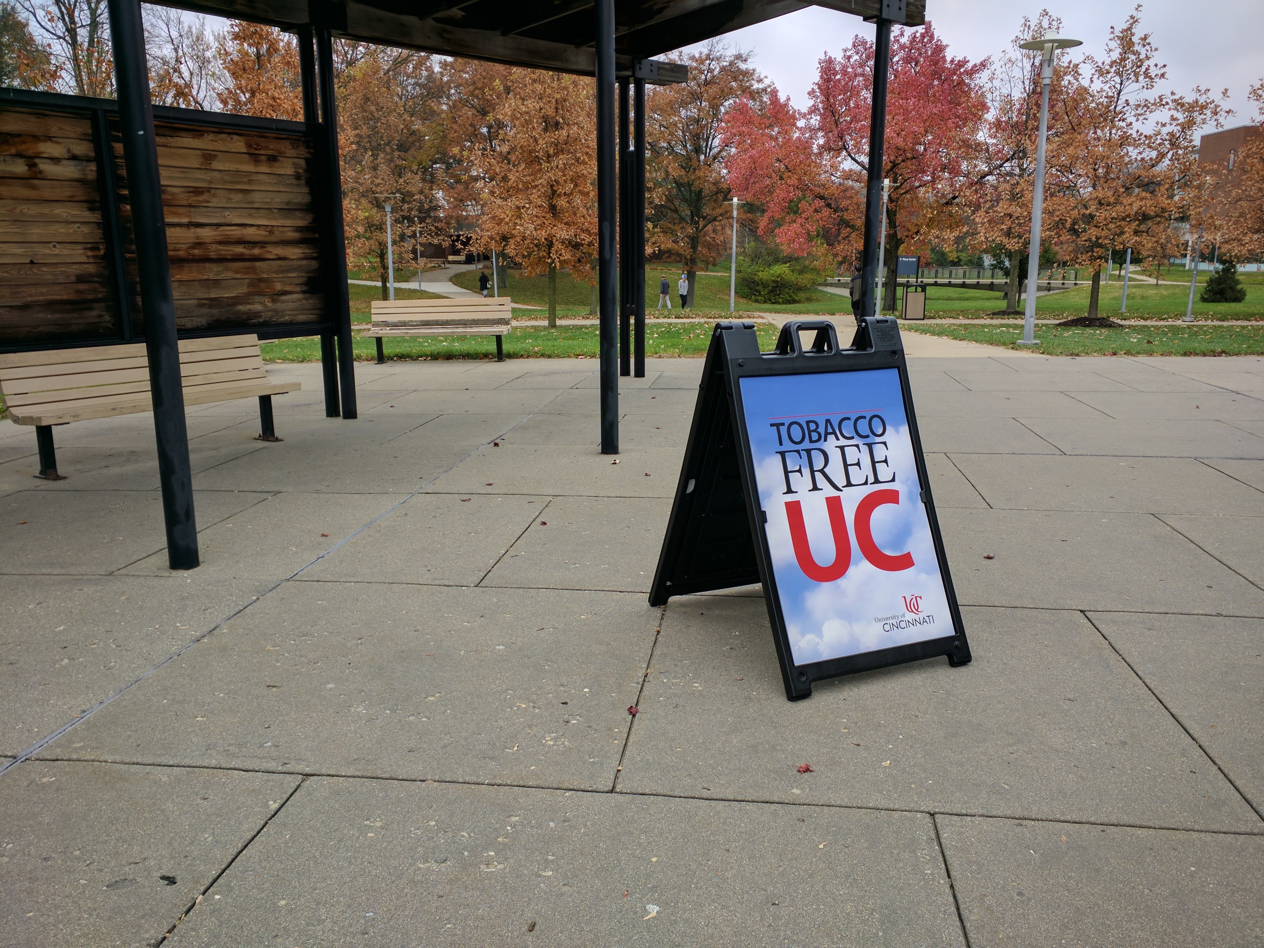 A Tobacco Free UC sign sits near an entrance to Muntz Hall.