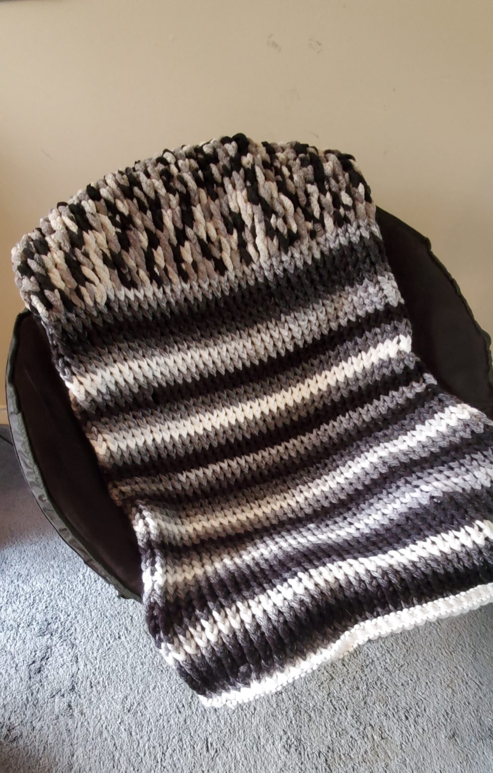 Time for a New Hobby? Here’s How to Make a Twisted Knit Stitch Blanket